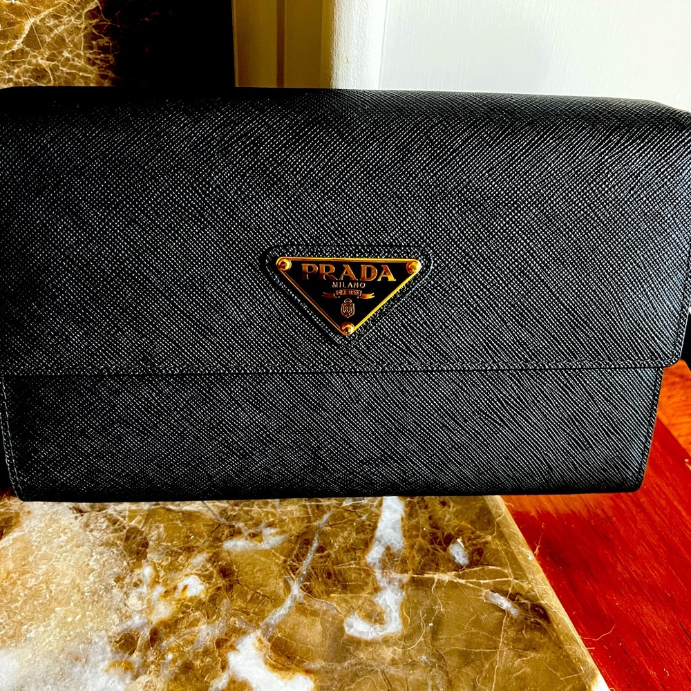 Prada Santiago and leather Wallet with Shoulder strap. Two bill comp and 8 cc .